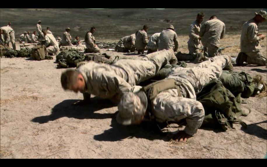 students-who-pass-do-the-traditional-push-ups-with - 