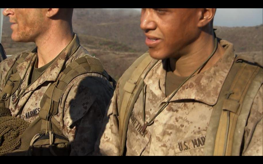 newly-minted-hogs-are-presented-with-a-hogs-tooth- - 