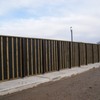 Absorptive and reflective timber barriers
