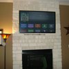 TV on Brick Fireplace Insta... - Houston Custom Installers