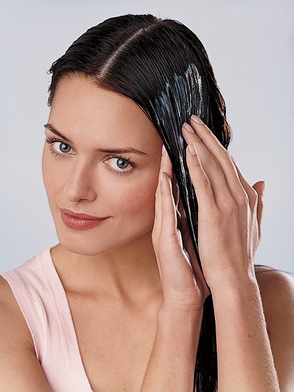 applying hair conditioner  http://www.healthbuzzer.com/nuviante/