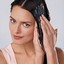 applying hair conditioner -  http://www.healthbuzzer.com/nuviante/