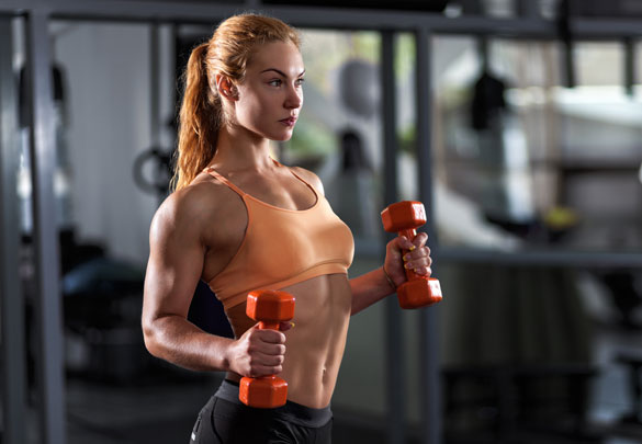 Sportive-young-woman-doing-exercise-with-dumbbells http://www.healthbuzzer.com/testo-black-xt/
