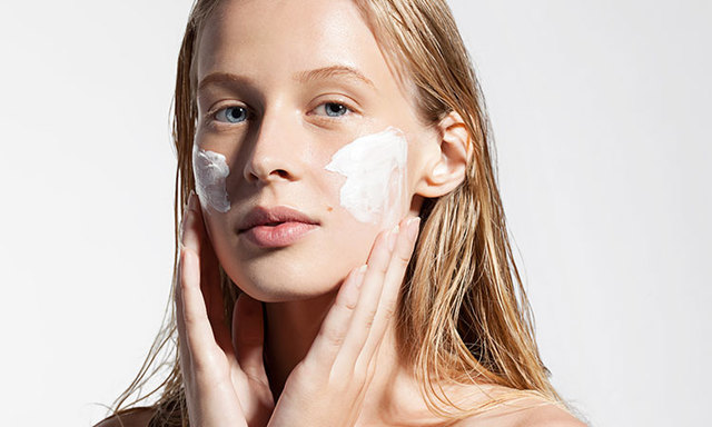 Blond-woman-applying-cream-on-face-1 http://www.wecareskincare.com/transform-derma-serum/