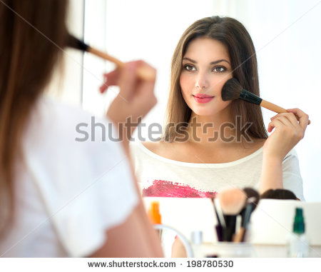 stock-photo-beauty-woman-applying-makeup-beautiful https://nuvieskincareserum.com/donna-belle-beauty/