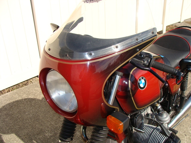 6240140 '81 R100S Red Smoke.04 1981 BMW R100S #6240140, Smoke Red. 60,090 Miles. Koni Shocks; Progressive Fork Springs w/ Anti Dive Kit; 336 Sport Cam; Stainless Mufflers; Sargent Sport Seat; Reynolds Ride-Off Stand; Brown Side Stand; Napoleon Baren Mirrors; Euro Headlight switch; New 