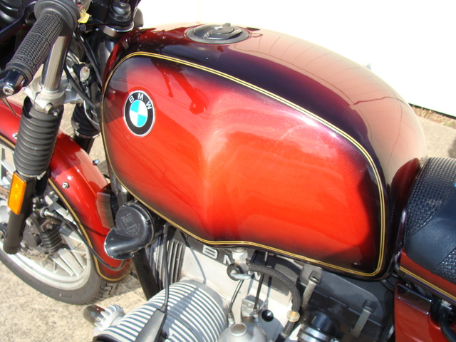 6240140 '81 R100S Red Smoke.06 1981 BMW R100S #6240140, Smoke Red. 60,090 Miles. Koni Shocks; Progressive Fork Springs w/ Anti Dive Kit; 336 Sport Cam; Stainless Mufflers; Sargent Sport Seat; Reynolds Ride-Off Stand; Brown Side Stand; Napoleon Baren Mirrors; Euro Headlight switch; New 