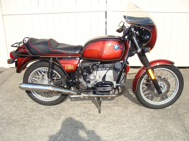 6240140 '81 R100S Red Smoke.17 1981 BMW R100S #6240140, Smoke Red. 60,090 Miles. Koni Shocks; Progressive Fork Springs w/ Anti Dive Kit; 336 Sport Cam; Stainless Mufflers; Sargent Sport Seat; Reynolds Ride-Off Stand; Brown Side Stand; Napoleon Baren Mirrors; Euro Headlight switch; New 