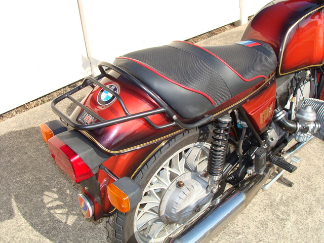 6240140 '81 R100S Red Smoke.19 1981 BMW R100S #6240140, Smoke Red. 60,090 Miles. Koni Shocks; Progressive Fork Springs w/ Anti Dive Kit; 336 Sport Cam; Stainless Mufflers; Sargent Sport Seat; Reynolds Ride-Off Stand; Brown Side Stand; Napoleon Baren Mirrors; Euro Headlight switch; New 