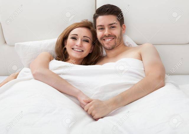 20504847-portrait-of-happy-young-couple-lying-on-b Picture Box