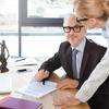 mature-lawyers-working-with... - E electronic Notary Brooklyn
