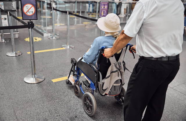 Do wheelchairs board first on American airlines? Picture Box