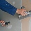plasterer-man-works-plaster... - Picture Box