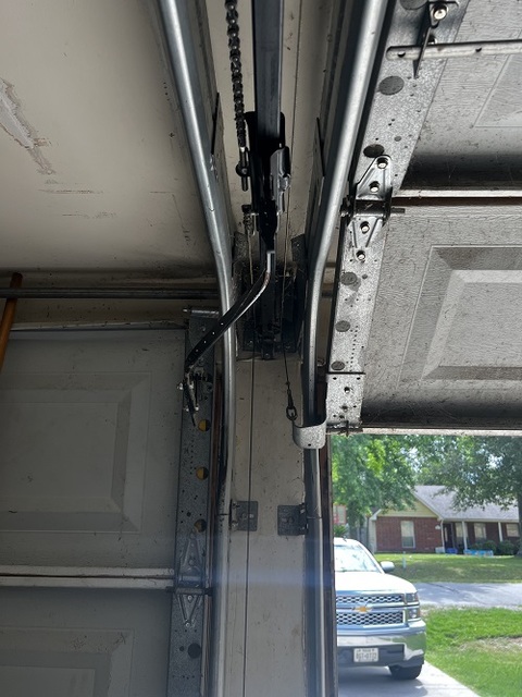 garage door off track American Overhead Garage Door Repair