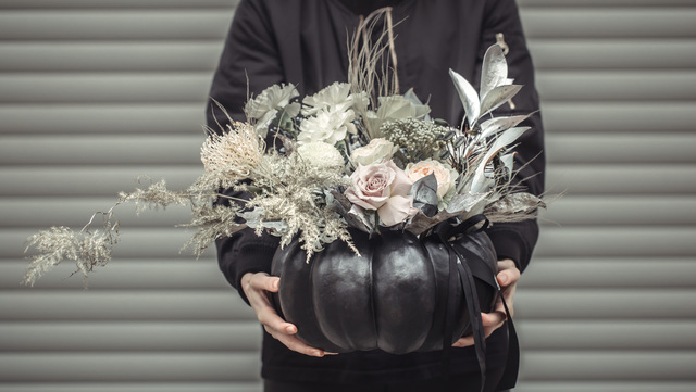 girl-holding-flower-arrangement-pumpkin Picture Box