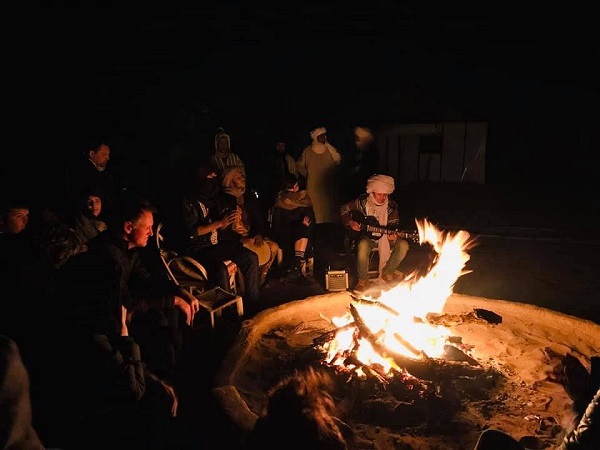 songs-around-the-fire Sun Trails | Private Luxury Tours in Morocco | Sahara Desert | Honeymoon Travel | All-Inclusive Vacation Packages