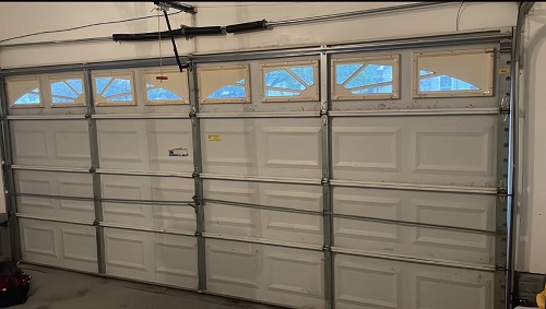 4 Genesis Garage Doors & Gates