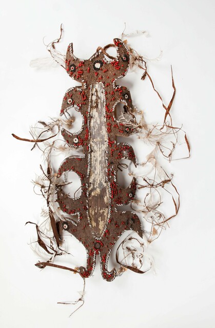 TM-526-11  Dema afbeelding in de vorm van een duiz etnografica