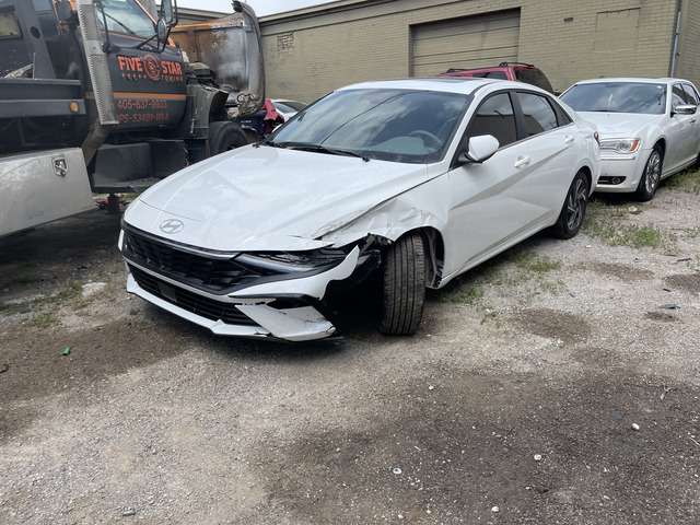 White Hyundai Body Work and Paint Job (1) Syed Brothers Auto Body Shop OKC