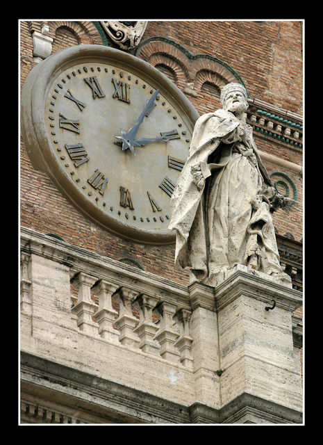 Santa Maria Maggiore clock Italy photos