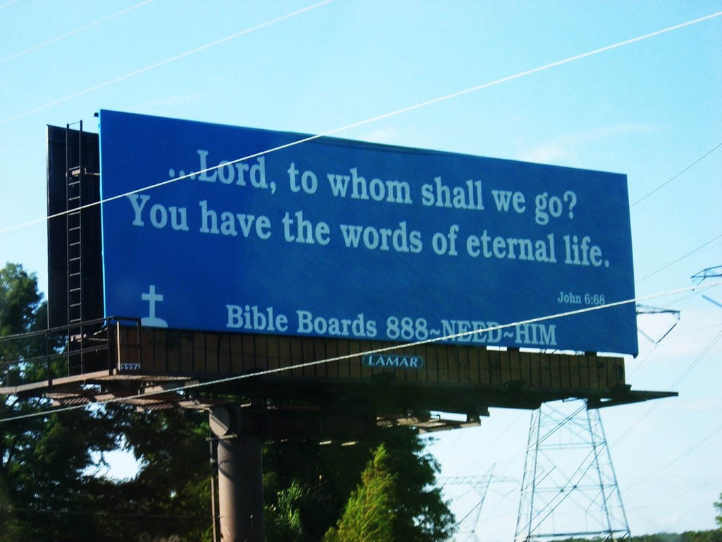 CIMG6063 - Billboards, Bikes, Roadsighns