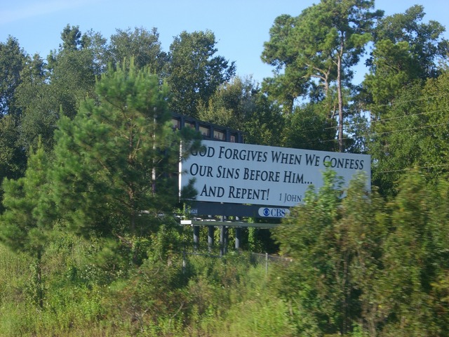 CIMG6057 Billboards, Bikes, Roadsighns