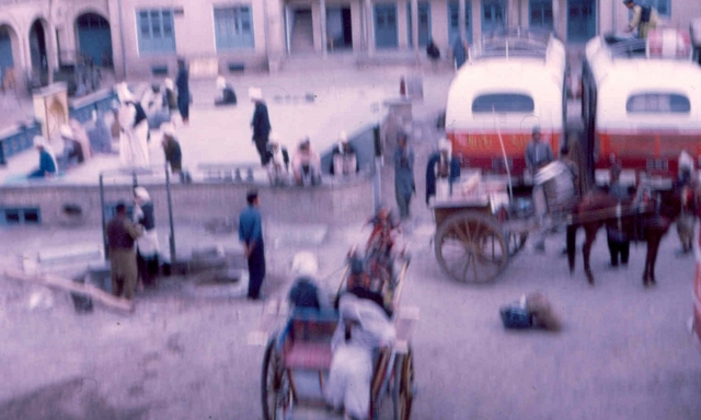 Herat Busses and cabs behind the hotel Afghanstan 1971, on the road