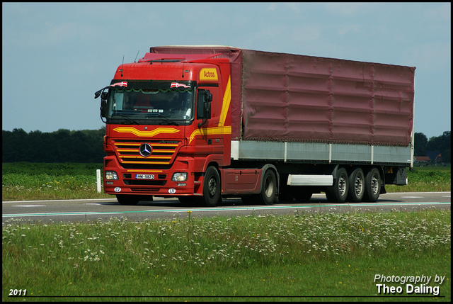 Mercedes rood  HM - 9873  (LV) Buitenlandse Vrachtwagens   2011